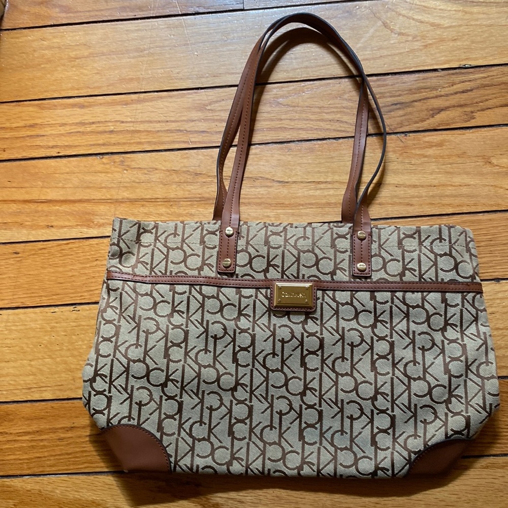 Calvin Klein Tote purse, Monogram Ck all around and inside,